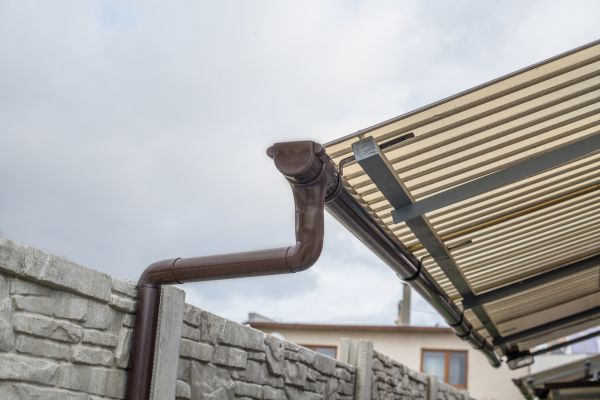 Plastic Downspout Installation in West Bend